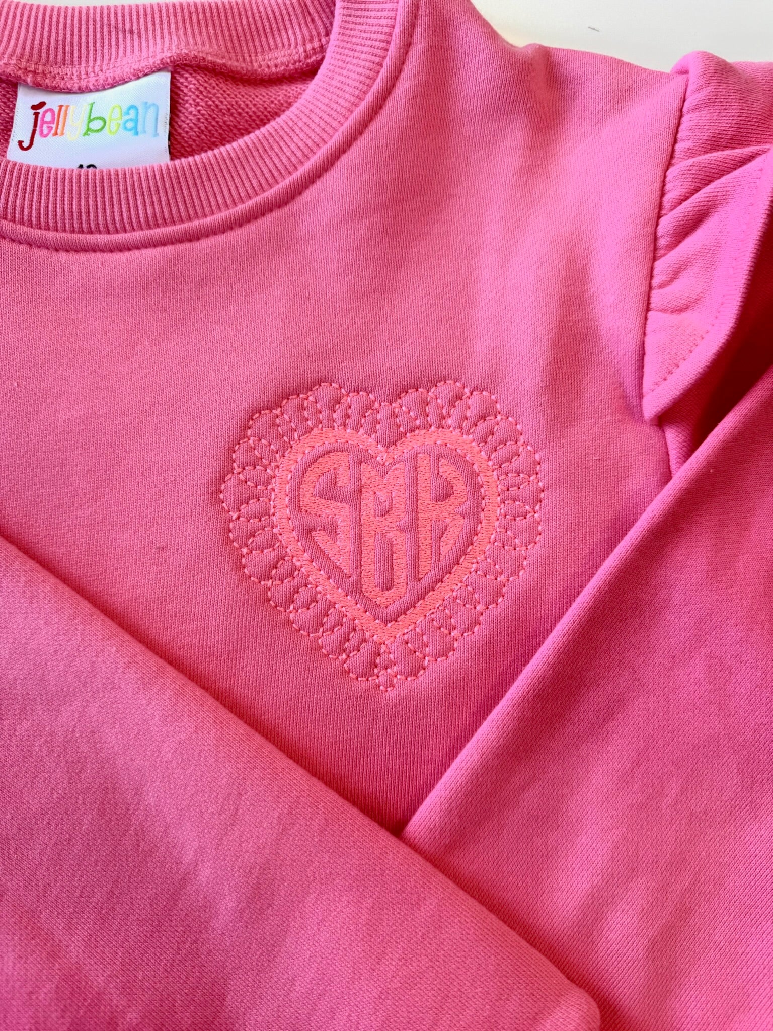 Pink Embroidered Ruffle Sweatshirt