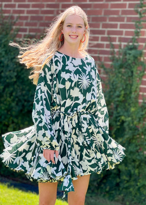<img src="girl in green mini dress.jpg" alt="girl wearing pink mini green floral dress with orange hoop earring">